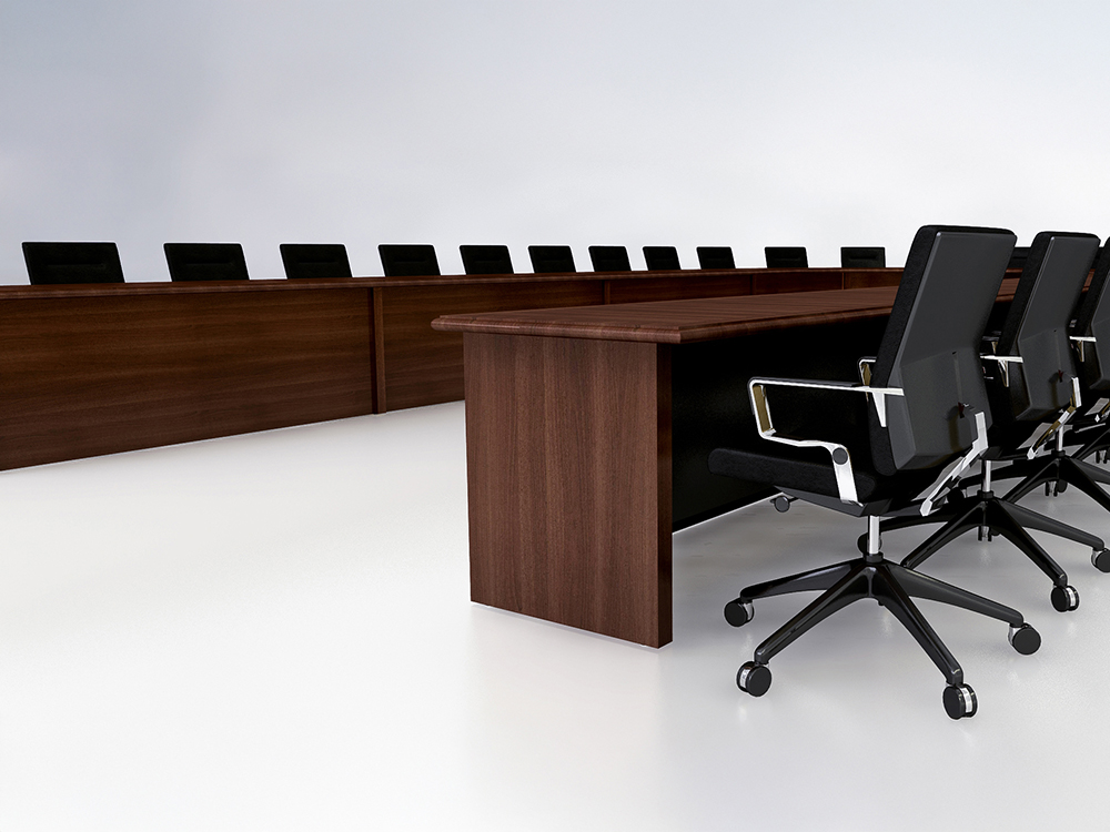 Large custom U-shaped conference room table with deep, dark wood veneer for videoconferencing including AV integration